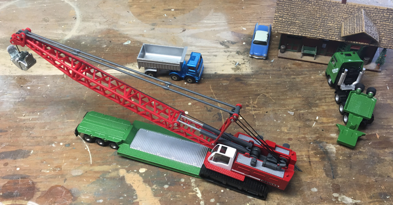 That is how 1:1 lowboy trailers actually work, the front end splits off like this.